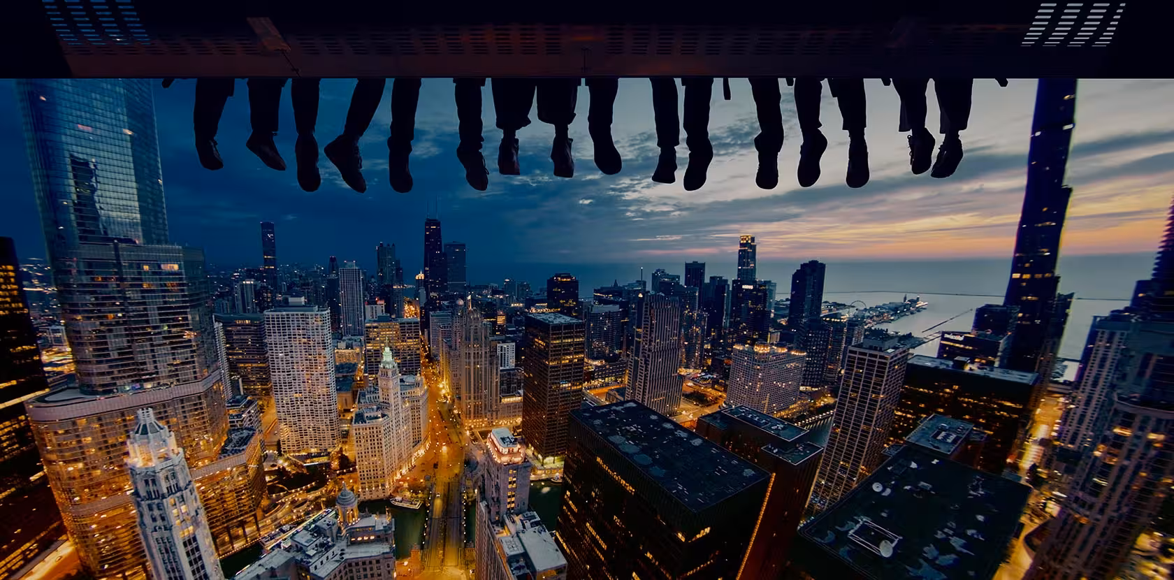 Flyover Flyover attraction experience showing immersive aerial city view with riders suspended above a panoramic skyline